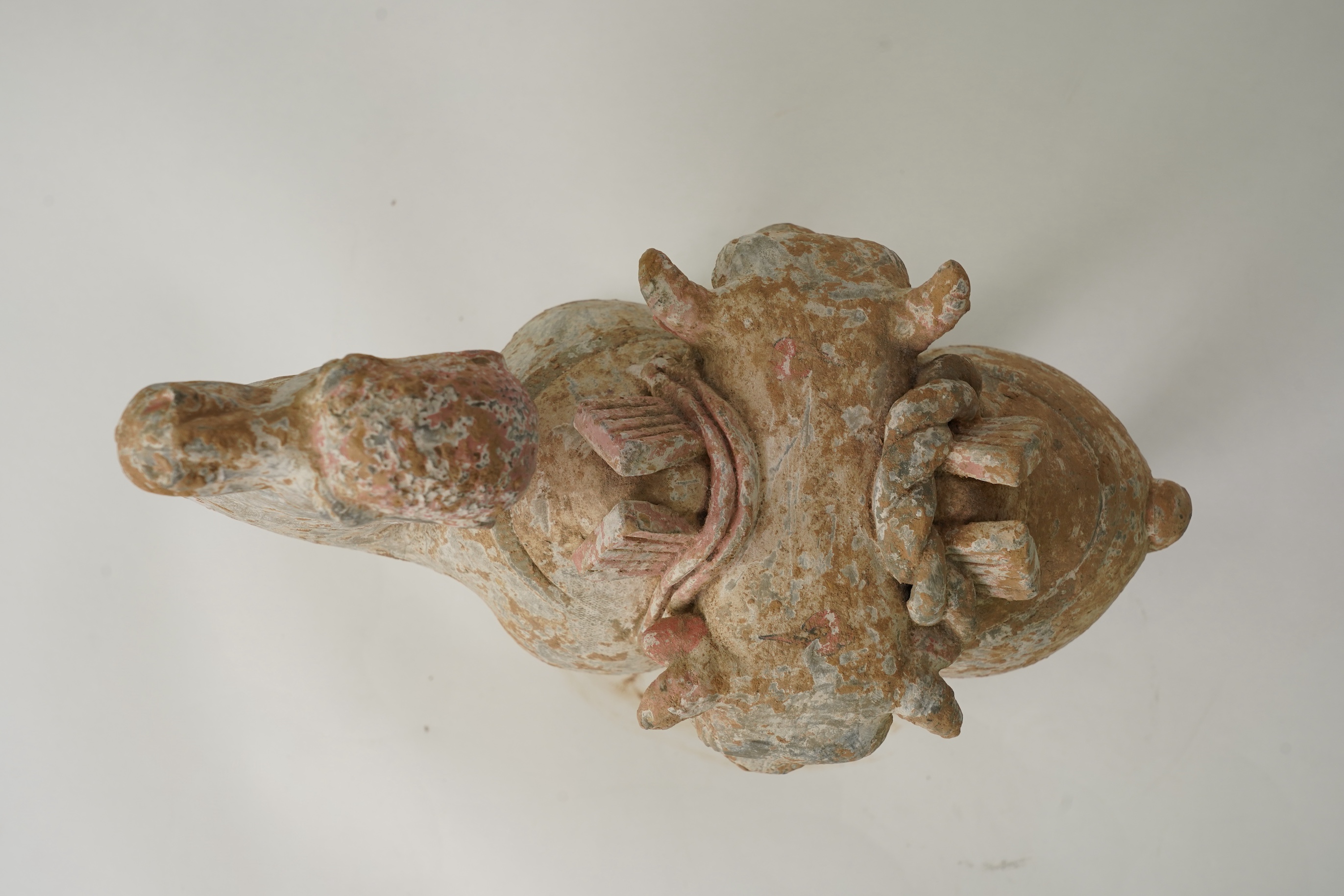 A Chinese pottery tomb figure of a Bactrian camel, Tang dynasty or later